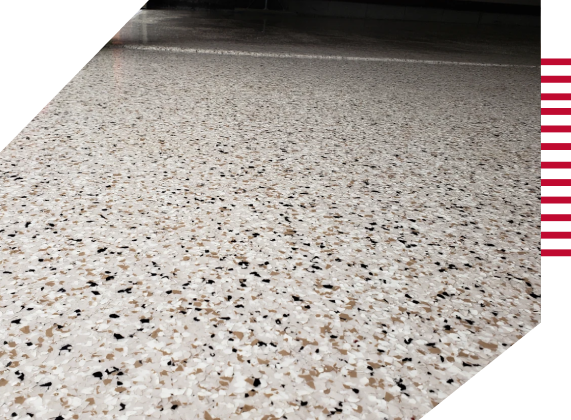 A close up of the floor in a garage